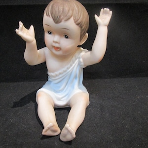 Piano baby figurine