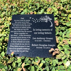 May include: Black granite memorial plaque with a poem about a father and the dates of birth and death of two men: Leo Anthony Grasso (6/13/1951 - 7/29/2001) and Robert Douglas Joseph (6/5/1948 - 6/11/2015).