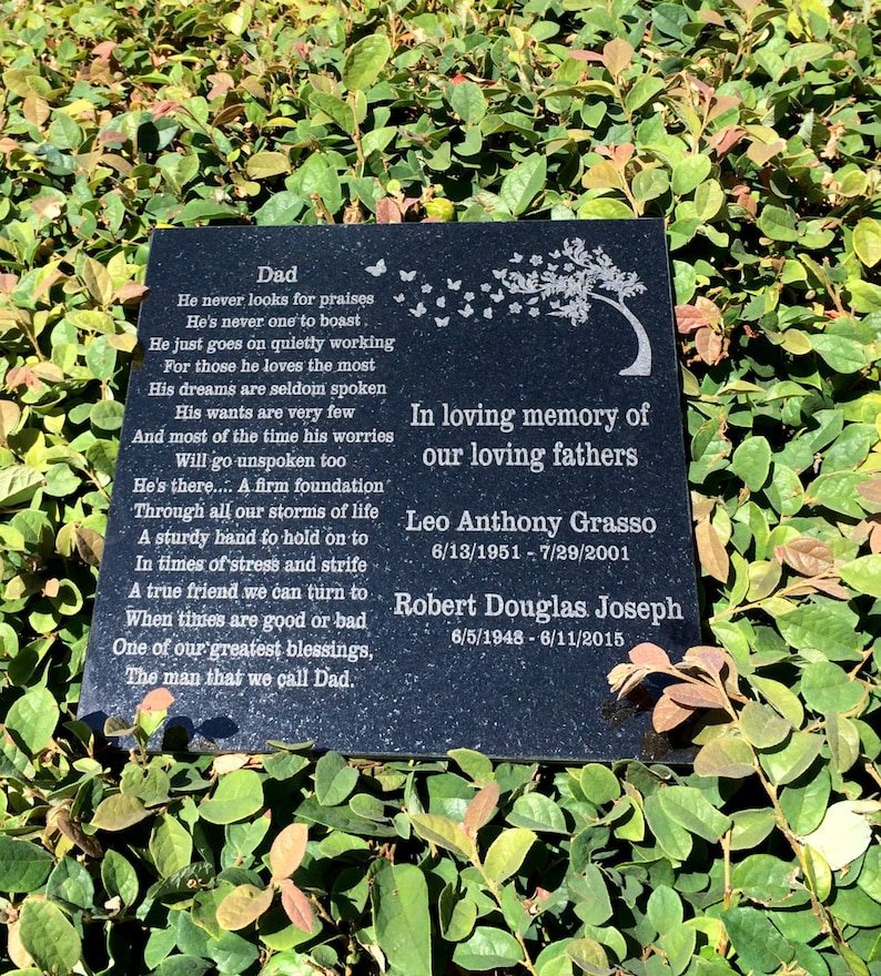 May include: Black granite memorial plaque with a poem about a father and the dates of birth and death of two men: Leo Anthony Grasso (6/13/1951 - 7/29/2001) and Robert Douglas Joseph (6/5/1948 - 6/11/2015).