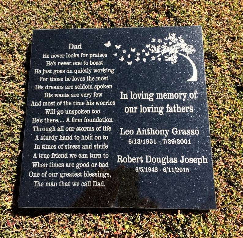May include: Black granite memorial stone with a poem about a father and a tree with butterflies flying away. The stone has the names Leo Anthony Grasso, 6/13/1951 - 7/29/2001 and Robert Douglas Joseph, 6/5/1948 - 6/11/2015.