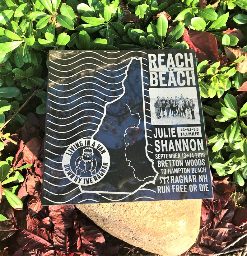 May include: Black and white image of a map of New Hampshire with the text "Reach the Beach" and "Julie Shannon" on it. The image also includes the text "Living in a Van Down by the Ragnar" and "Ragnar NH Run Free or Die".