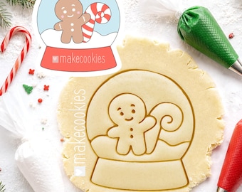 Christmas Snow Globe Cookie Cutter with Gingerbread Man and Candy Cane Imprint for holiday baking, fondant and crafts