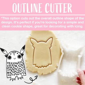 May include: A cookie cutter with the text "OUTLINE CUTTER" above a cut-out cookie in the shape of a cartoon creature. The cookie cutter is white and the cookie dough is light brown. A cartoon illustration of the creature is on the left.