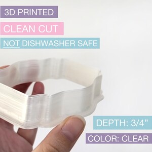May include: A clear, 3D-printed cookie cutter with a decorative edge. The depth is 3/4 inch. The text on the image says "3D PRINTED", "CLEAN CUT", and "NOT DISHWASHER SAFE".