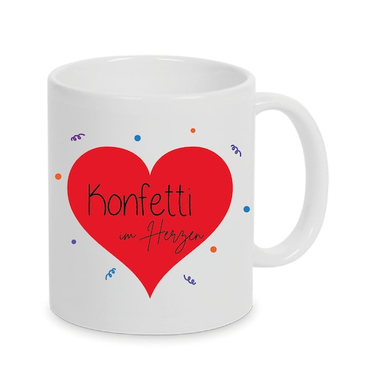 Personalized cup with carnival confetti in the heart can also be individually designed with a name or desired text