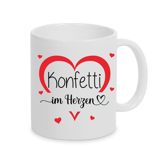 Personalized cup with carnival confetti in the heart can also be individually designed with a name or desired text