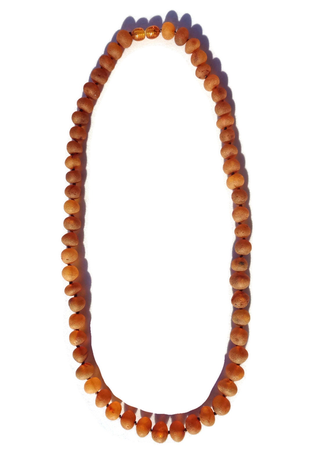 amber necklace for back pain