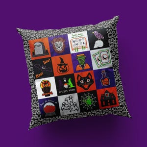 May include: A square throw pillow featuring a grid of sixteen embroidered Halloween-themed squares, including a tombstone, werewolf, spellbook with text, raven, bat, pumpkin, monster, cards, owl, witch, cat, potion, crystal ball, ghosts, web, and house.