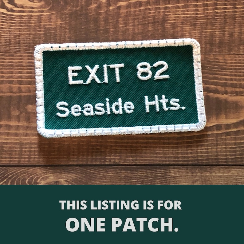 Puede incluir: Parche bordado verde y blanco con costuras blancas alrededor de los bordes. El parche dice "EXIT 82 Seaside Hts."