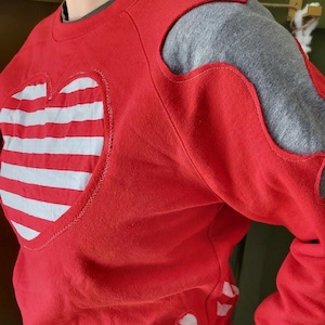 Reworked Champ!on crewneck sweatshirt. Cutout one of one reworked red sweatshirt