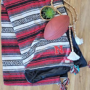 Nebraska Corn Huskers blanket. Red Mexican blanket paired with super soft Minky plush