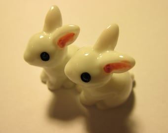 small plastic bunny figurines