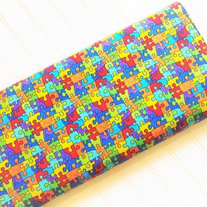 Crayon-Party-Puzzle-Pieces-Bright-Autistic-Spectrum-Rainbow-Pride-Colors-Timeless Treasure-Cotton-Quilting-Fat-Quarters-Fabric-By-The-Yard