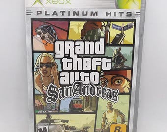 Grand Theft Auto San Andreas OG XBOX Platinum, completo con caja, mapa y manual, probado y funcionando.