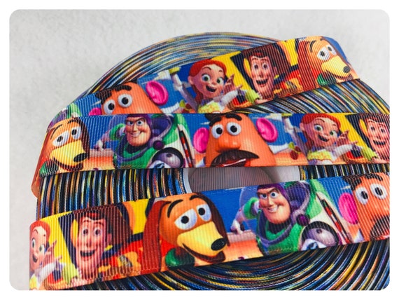 Toy Story 1/" grosgrain ribbon the listing is for 3 yards and 2 flat resin