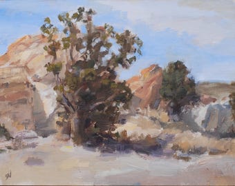 May include: Oil painting of a desert landscape featuring tan rock formations, green trees, and a light blue sky. The artwork has a painterly style with visible brushstrokes and a muted color palette. The scene depicts a natural environment.