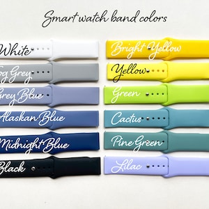 May include: A set of 10 silicone watch bands in various colors, including white, fog grey, grey blue, Alaskan blue, midnight blue, black, bright yellow, yellow, green, cactus, pine green, and lilac.