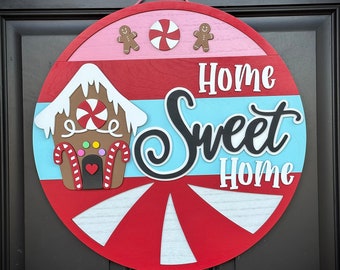 A "Home Sweet Home" Gingerbread House-Themed Round Door Hanger Sign, Perfect for Displaying on Front Door, Available in 2 Sizes