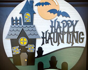 A Halloween Haunted-House-Themed Round Door Hanger,| So Cute to Display on Front Door, 3D, "Happy Hauntings," and Available in 2 Sizes