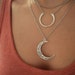 see more listings in the Silver/Black necklaces section