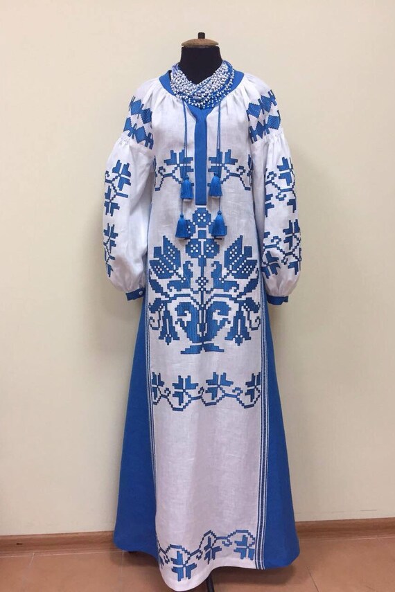 white maxi dress with blue embroidery