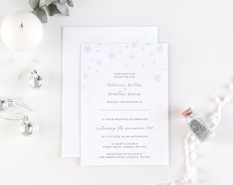 A6 Snowflake Wedding Invitation Kit with blue Snow, perfect for a Christmas, Winter, December Wedding. Printable PDF at home