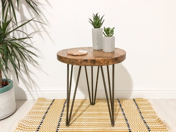 Mesa auxiliar redonda de madera rústica / de tablas de - España