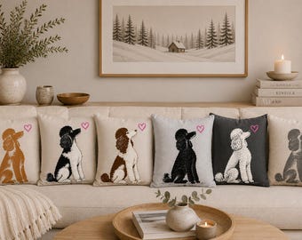 May include: A set of six square throw pillows, each featuring a different colored poodle sitting in profile. The poodles are depicted in shades of brown, black and white, and gray. Each pillow includes a small pink heart icon above the dog.