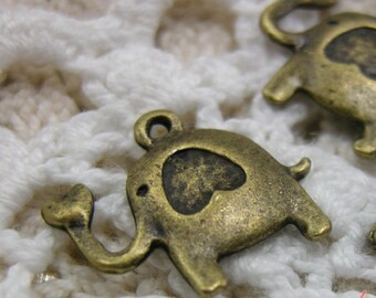 8 Elefanten mit Blume in antik Bronze