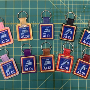 Aldi Quarter Keeper - Embroidered Aldi - available with quarter in gold, green, purple, lavender, pink, red, blue, brown or black vinyl