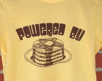 Powered By PANCAKES Screen Printed T Shirt Youth Womens Mens Sizes