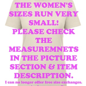 May include: Beige t-shirt with pink text that reads "THE WOMEN'S SIZES RUN VERY SMALL! PLEASE CHECK THE MEASUREMENTS IN THE PICTURE SECTION & ITEM DESCRIPTION. I can no longer offer free size exchanges. You've been warned! THANK YOU!"