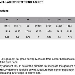May include: Size chart for a t-shirt with measurements in inches for body length, body width, and sleeve length. Sizes range from XS to 3XL.