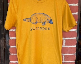 Camiseta unisex con estampado de ornitorrinco, una especie de patito feo.