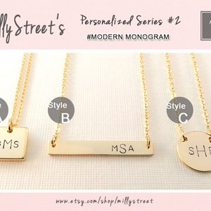 May include: Three gold necklaces with different pendant styles. The first necklace has a square pendant with the initials "GMS" engraved on it. The second necklace has a rectangular bar pendant with the initials "MSA" engraved on it. The third necklace has a round pendant with the initials "SHE" engraved on it.