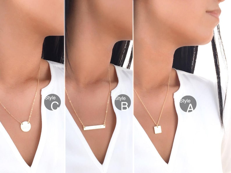 May include: Three gold necklaces with different pendant styles: a square, a bar, and a circle. The necklaces are on models wearing white shirts. The text "Style A", "Style B", and "Style C" is visible on the image.