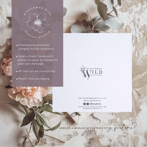 May include: A white greeting card with the "Midsummer Wild Design Studio" logo and text. The card is blank inside and printed on premium 300gsm Italian cardstock. The card is surrounded by flowers and greenery.