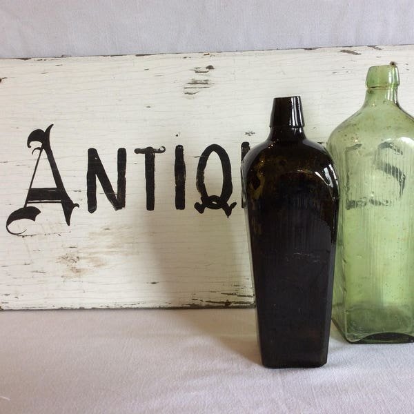 Antique dark amber case gin bottle coffin shape vertical ribbing applied lip
