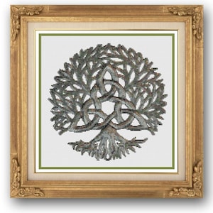 May include: A framed cross-stitch pattern of a tree of life with a Celtic knot design. The tree is in shades of green and grey, and the knot is in a silver colour.
