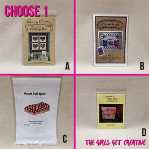 May include: Four craft pattern packets are displayed, each in a clear plastic bag or sleeve. The packets feature various quilt and craft designs, including heart-shaped patterns and a small purse. The text "CHOOSE 1" and "THE GIRLS GET CREATIVE" are also visible.