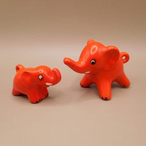 2 orange porcelain elephant miniatures / Goebel / West Germany / 1979 - 1990