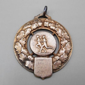 bronze or goldtone sports medal track running / France / 1940s - 1950s