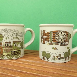 mugs with vehicles steam engine and zeppelin set of 2 / Japan / 1960 - 1980s