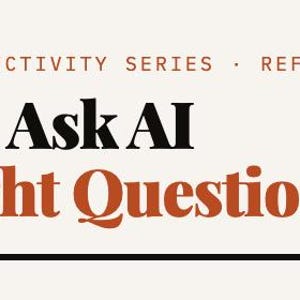 May include: A cream-coloured reference sheet with the title "How to Ask AI the Right Questions" in black and orange text. The text is part of the "Business Productivity Series."