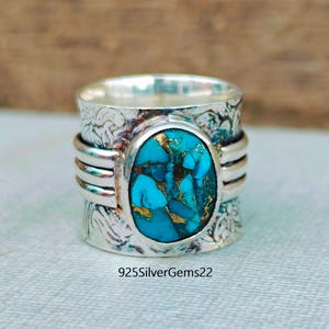 Anel em prata de lei 925 com turquesa azul acobreada, feito à mão.