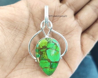 May include: A silver pendant with a green turquoise stone in a teardrop shape. The pendant is set in a silver frame with a delicate design. 925SilverGems22 is printed on the pendant.