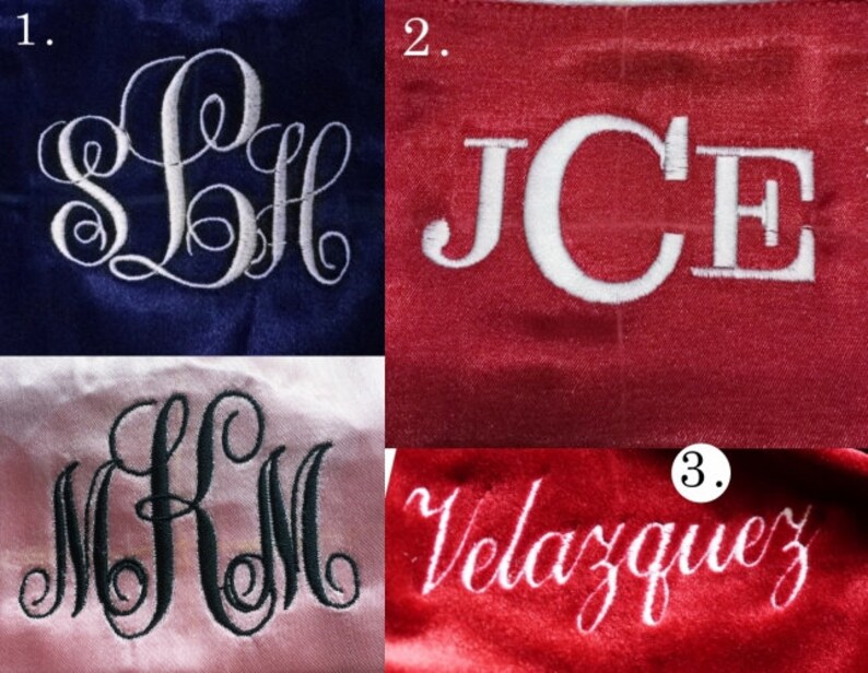May include: Three examples of personalized embroidery on fabric. The first is a white monogram "SLH" on a navy blue background. The second is a white monogram "JCE" on a red background. The third is a white name "Velazquez" on a red background.
