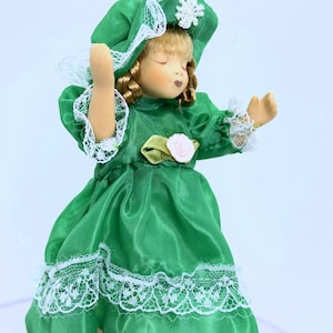 Collectible Porcelain  Girl Doll in Green Dress