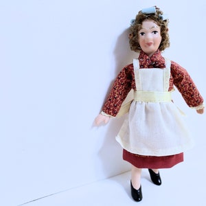 Dollhouse Miniature Porcelain Doll With Rollers in Her Hair 1:12 scale