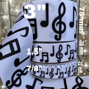 May include: White ribbon with black musical notes printed on it. The ribbon is available in three sizes: 3 inches, 1.5 inches, and 7/8 inches. The ribbon is 75 mm wide.